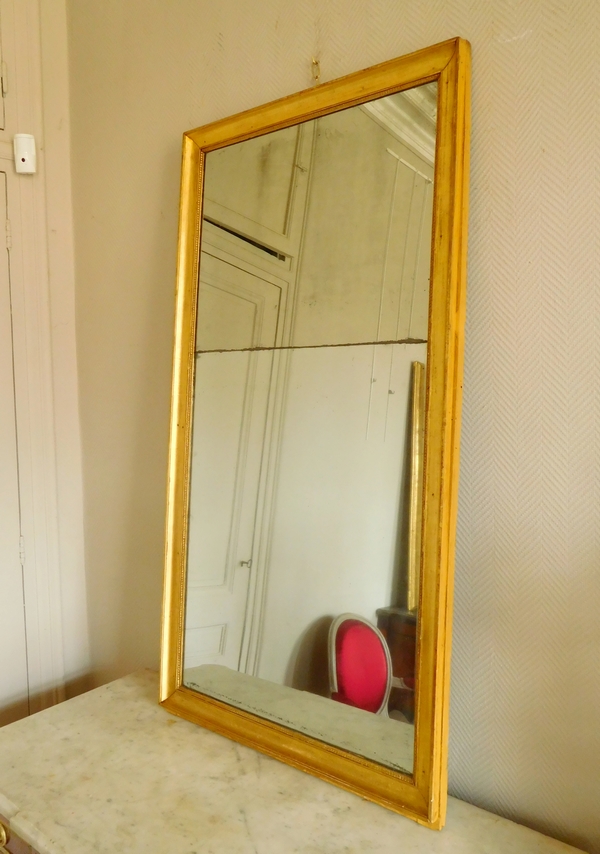 Empire fireplace mirror, gilt wood frame, mercury glass, 141cm x 76cm